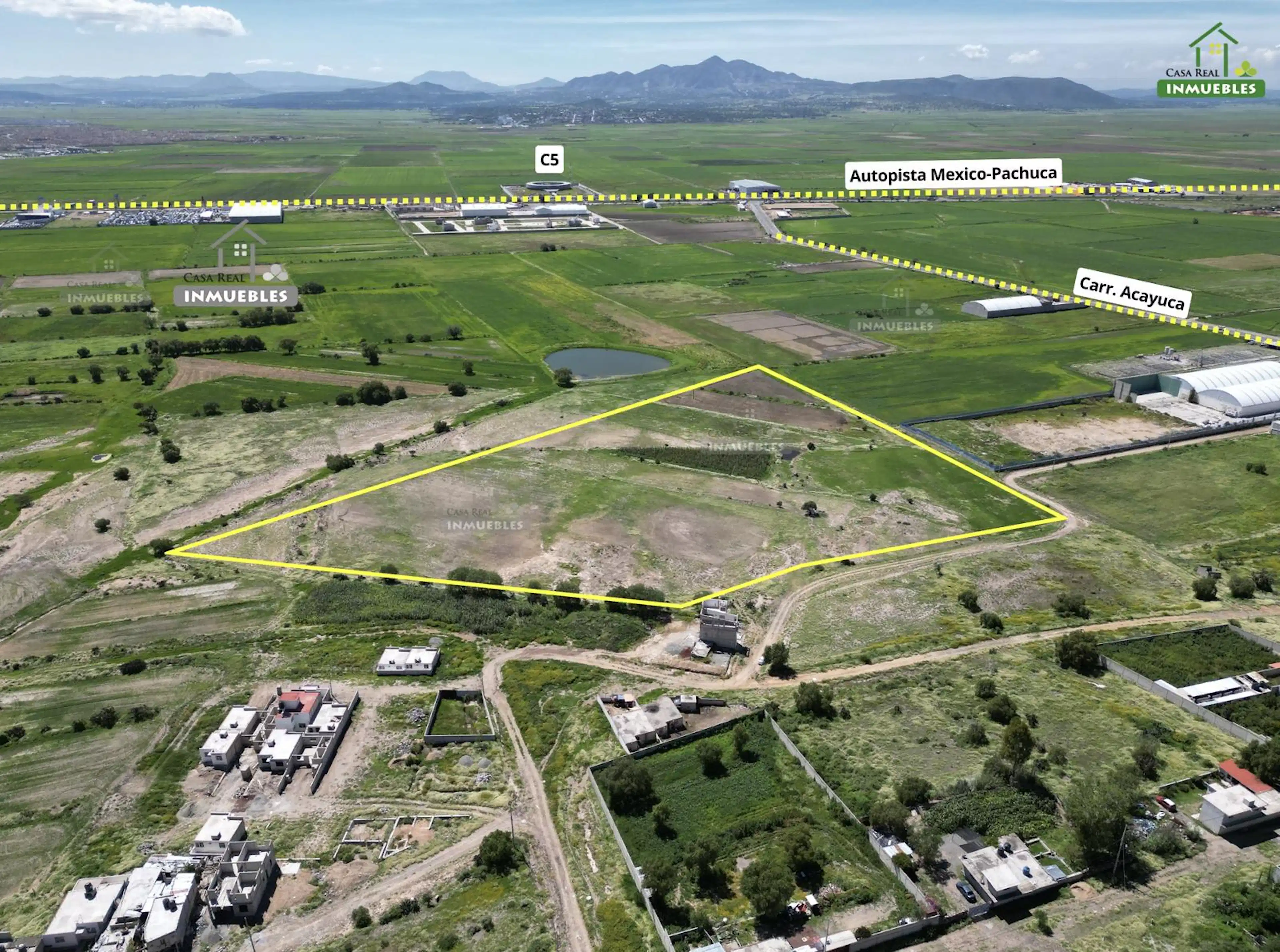 Terreno en entrada a San Pedro Huaquilpan (Autopista Mexico-Pachuca)