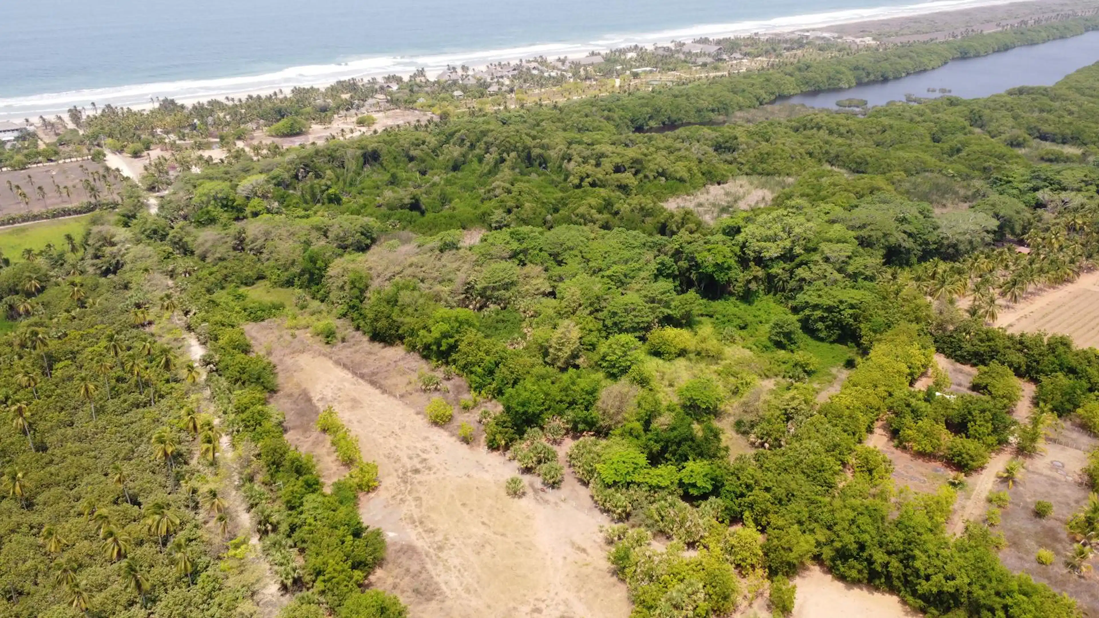 Terreno Con Escritura Publica En Ventanilla, Contiguo A Desarrollo Habitacional En Zona Premium.